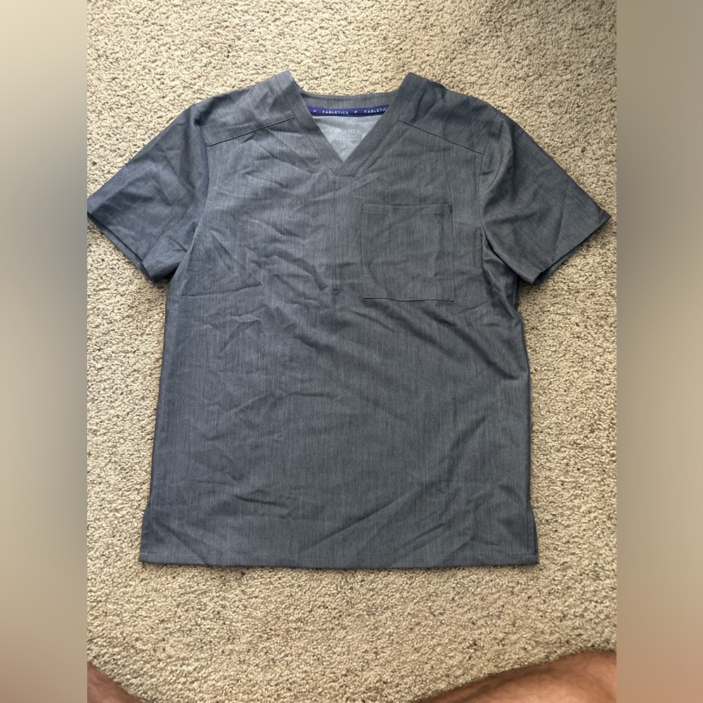 Brand new women’s fabletics top/scrub size xs